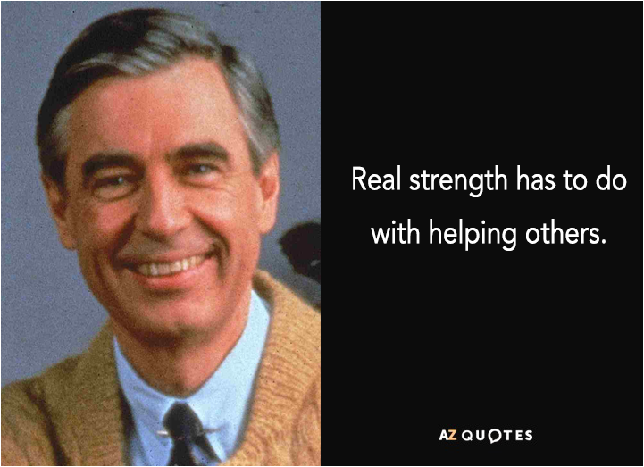 Close-up of a smiling man in a tan sweater and blue shirt, with a black box containing the quote: 'Real strength has to do with helping others.'